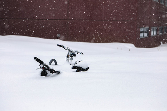 Bicycles Buried in Snow