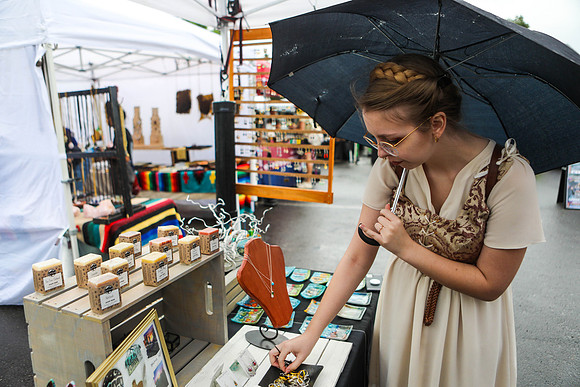 A Woman Shops for Jewelry in the Rain