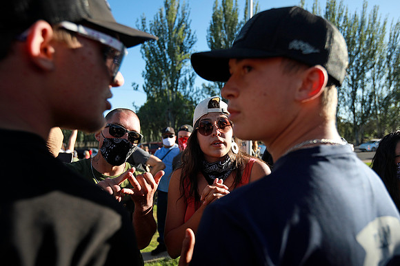 Opposite Sides Conflict at Back the Blue Rally