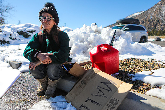 Un-Housed Woman Begs For Gas
