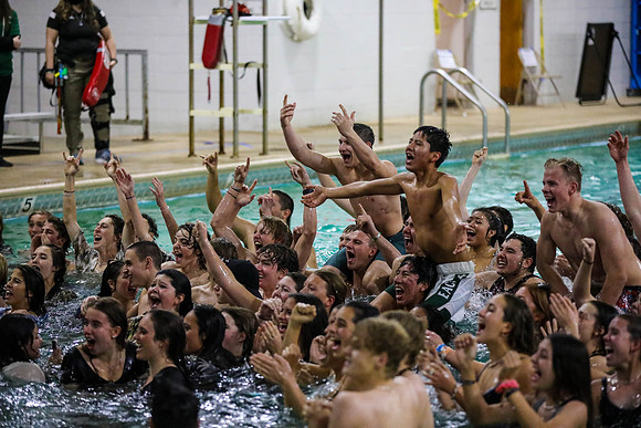 FHS Boys Basketball Celebrates After Victory